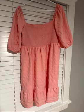 BCBGeneration Coral Pink Smocked Midi Dress with Puff Sleeves and Ruffle Hem